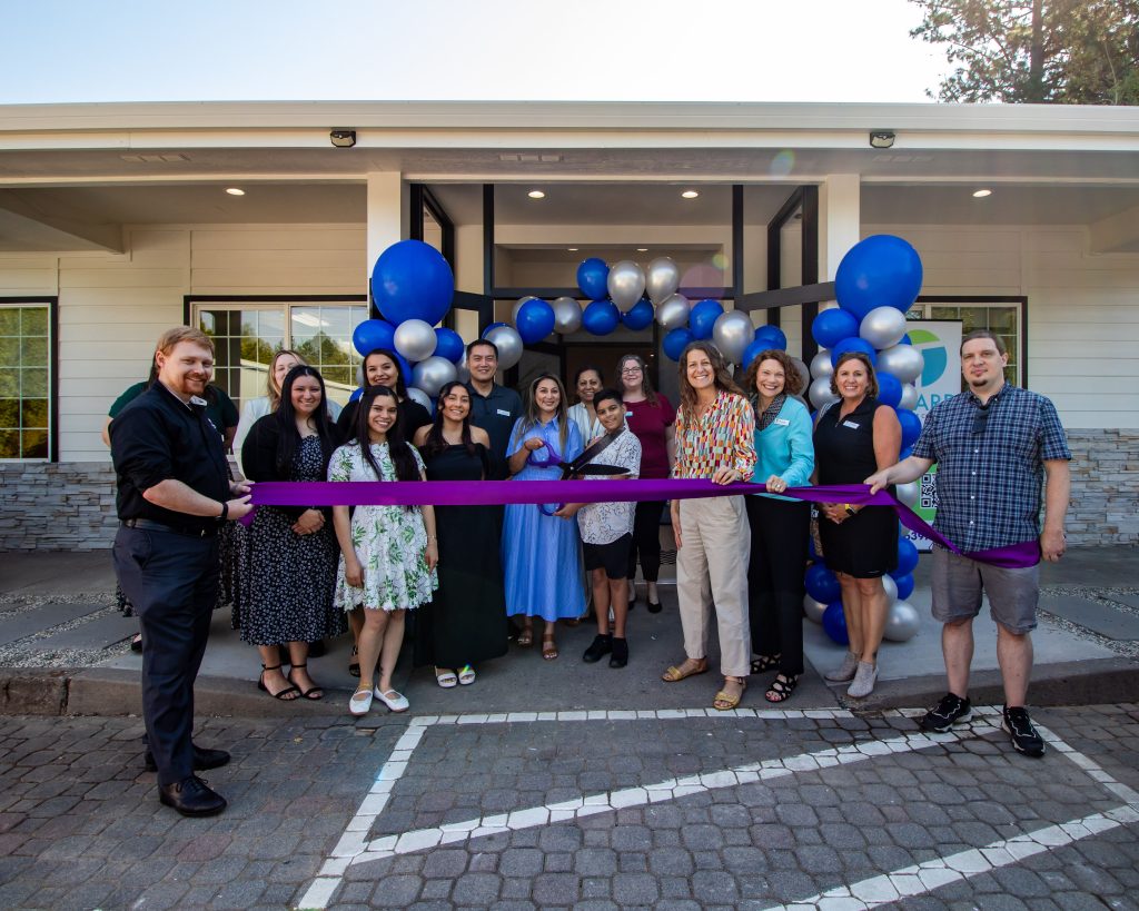 About Page replace first ribbon cutting photo